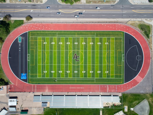 What is the meaning of the lines and numbers on the football field