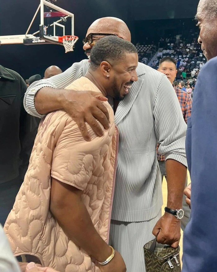 Steve Harvey and Michael B. Jordan hug